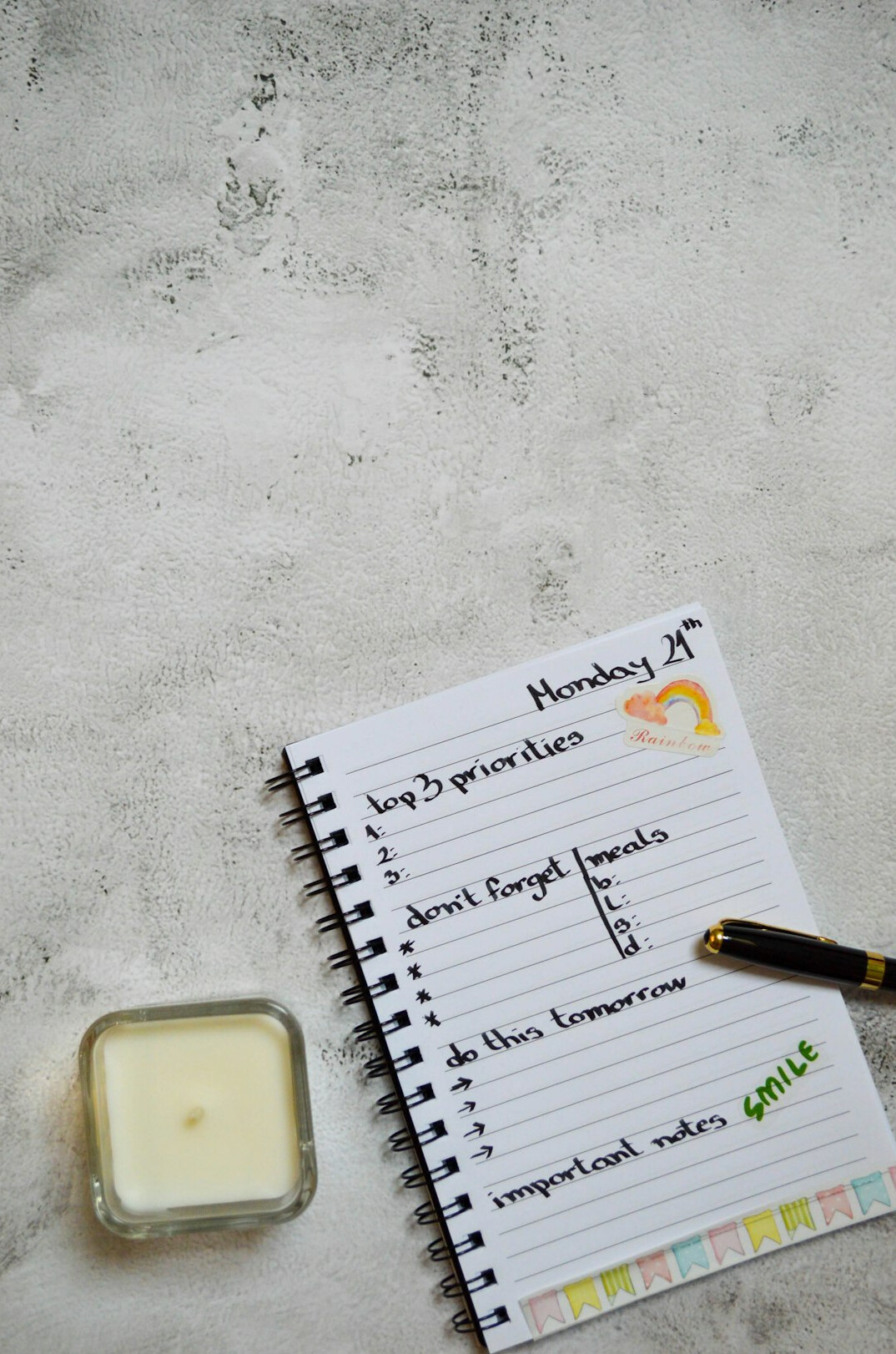 person tracking expenses notebook