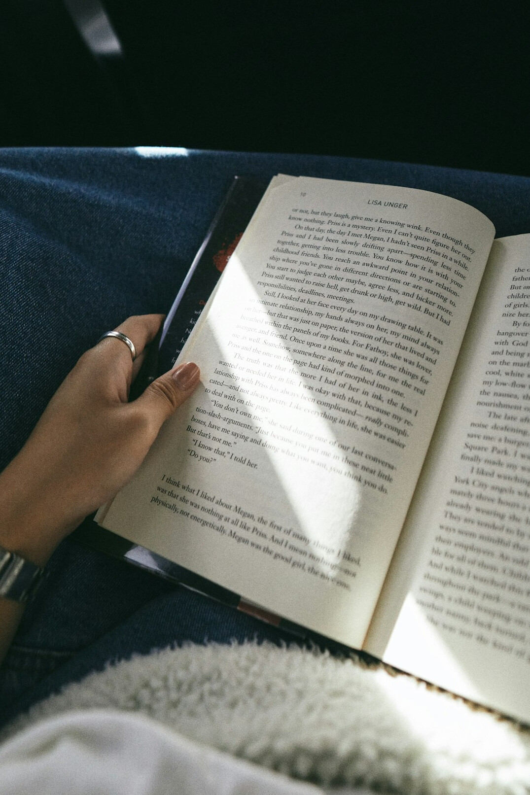 person reading financial book
