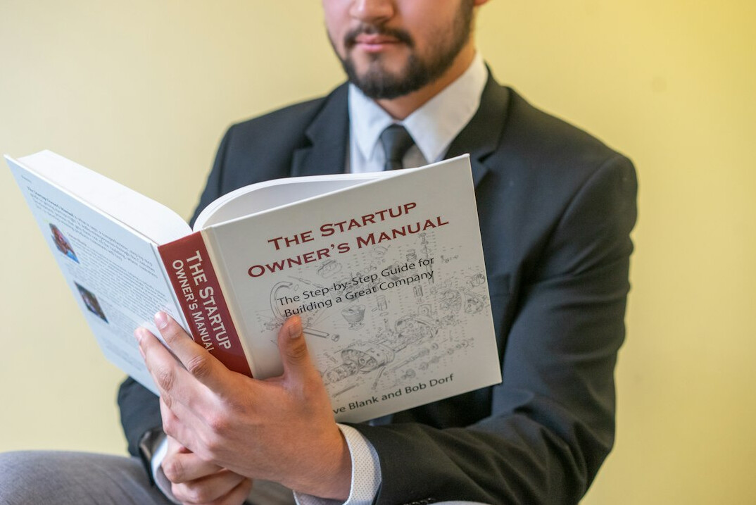 beginner investor reading book