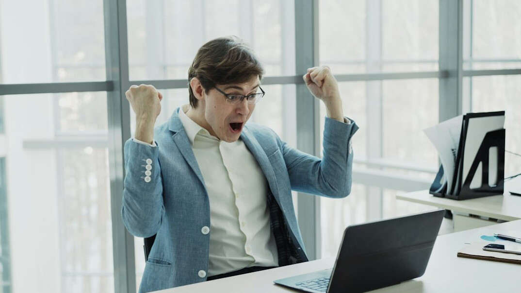 person celebrating financial success